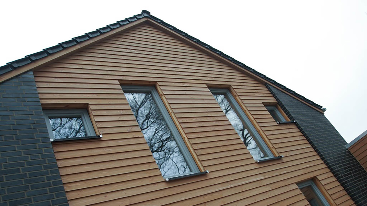 09_Wohnhaus_mit_6_sechs_Schlafzimmern_Verblendstein-Holzfassade_Klinker-Holz-Kombination_Gestaltungssatzung